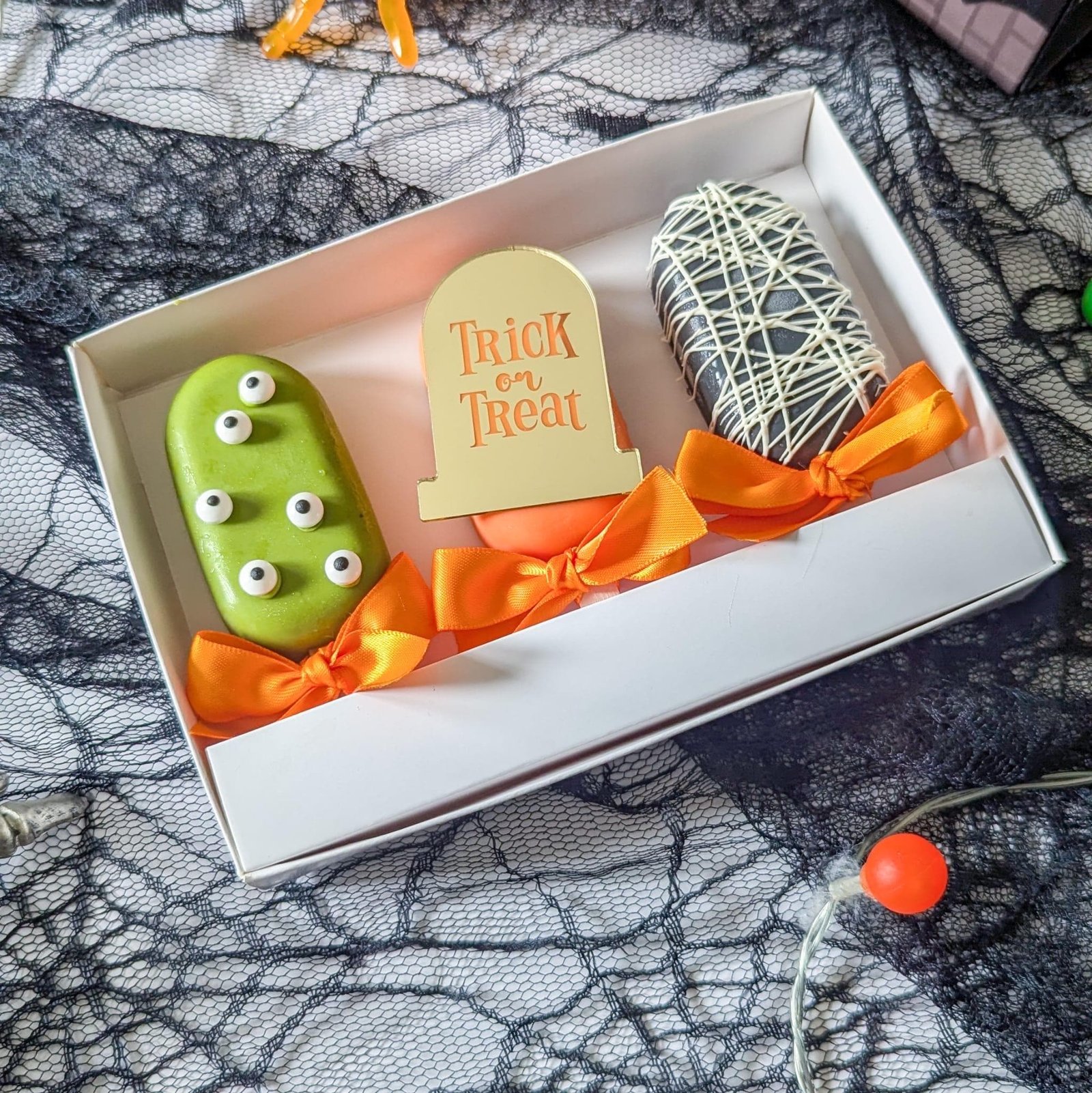 Trick or Treat gold acrylic tombstone